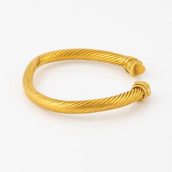 A Greco-Roman style presumably modern gold bracelet.