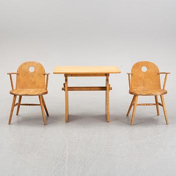 Uno Åhrén, a birch and beech table and pair of armchairs, Gemla, 1930's.