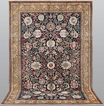 A silk Ghom carpet, 309 x 200 cm.