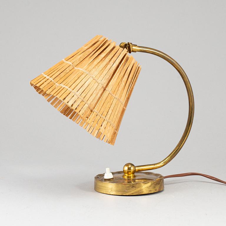 PAAVO TYNELL, a model 61032 table light from Idman, Finland.