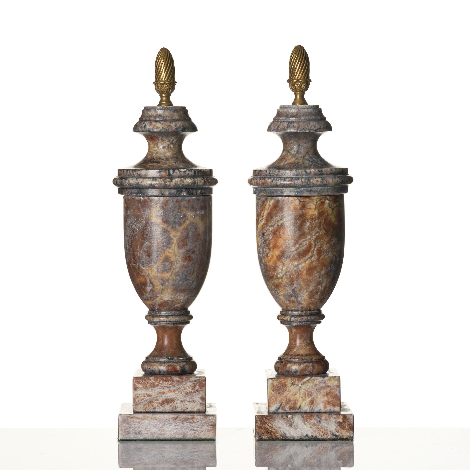 A pair of marble urns, around year 1900.