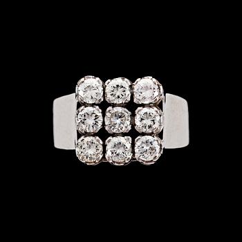 1005. RING, 9 briljantslipade diamanter, tot. 1.20 ct. Kjellins AB, Umeå, 1970.