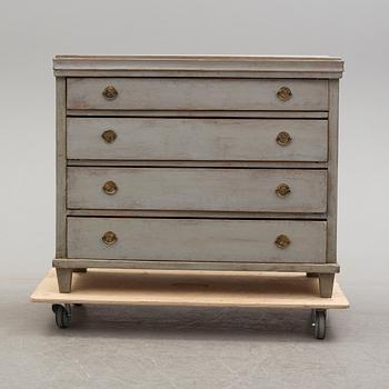 A mid 19th century painted chest of drawers.