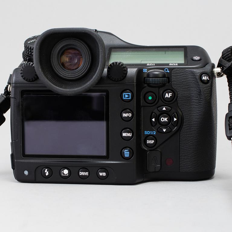 A black body medium format Pentax 645D camera with a SMC Pentax-D FA 645 55mm F2.8 AL [IF] SDM AW lens.