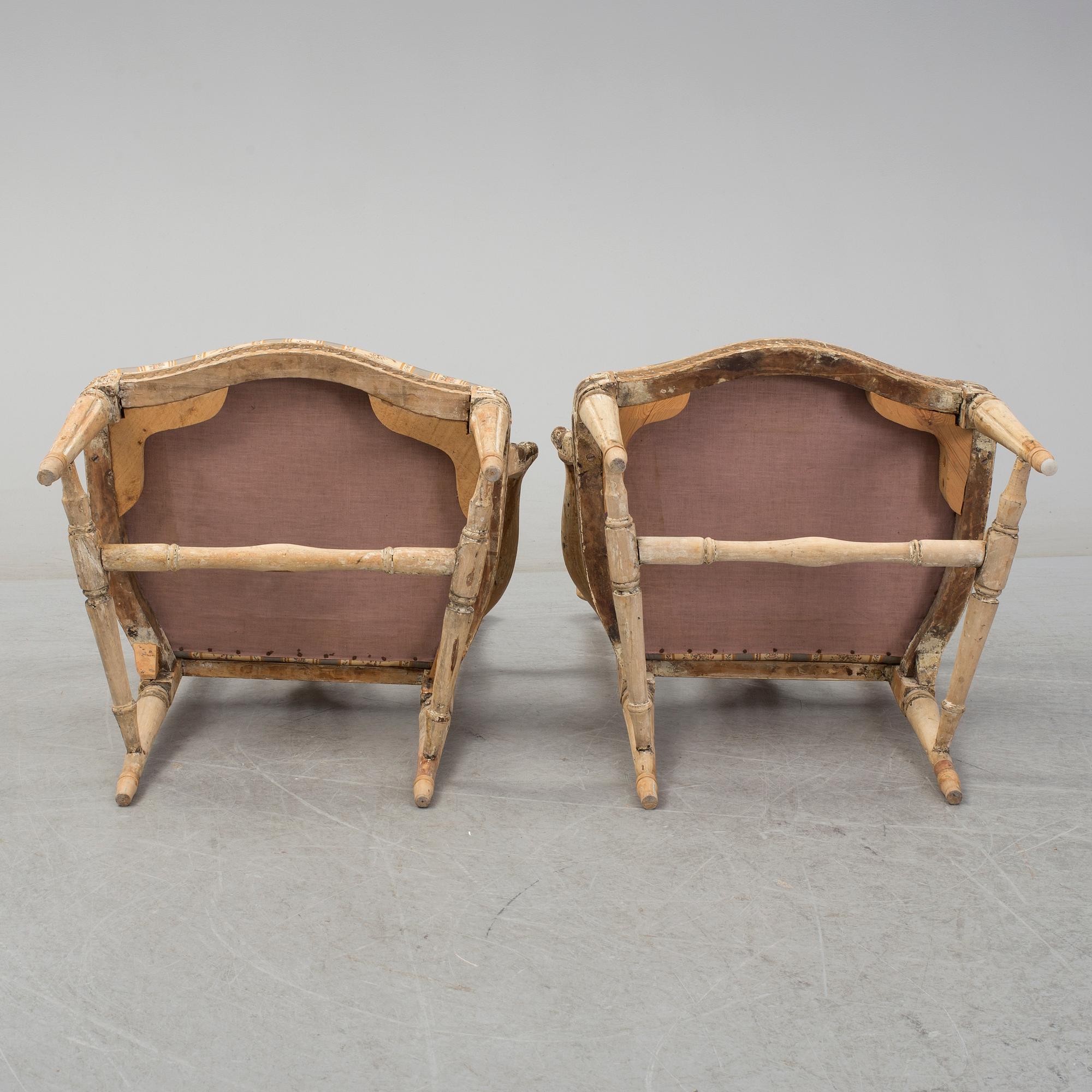 A pair of later part of th 18th century Gustavian arm chairs.