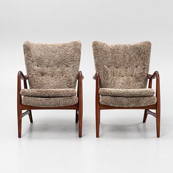 Ib Madsen & Acton SChubell, a pair of 'Pragh' armchairs, Madsen & SChubell Co, Denmark, 1940's/50's.