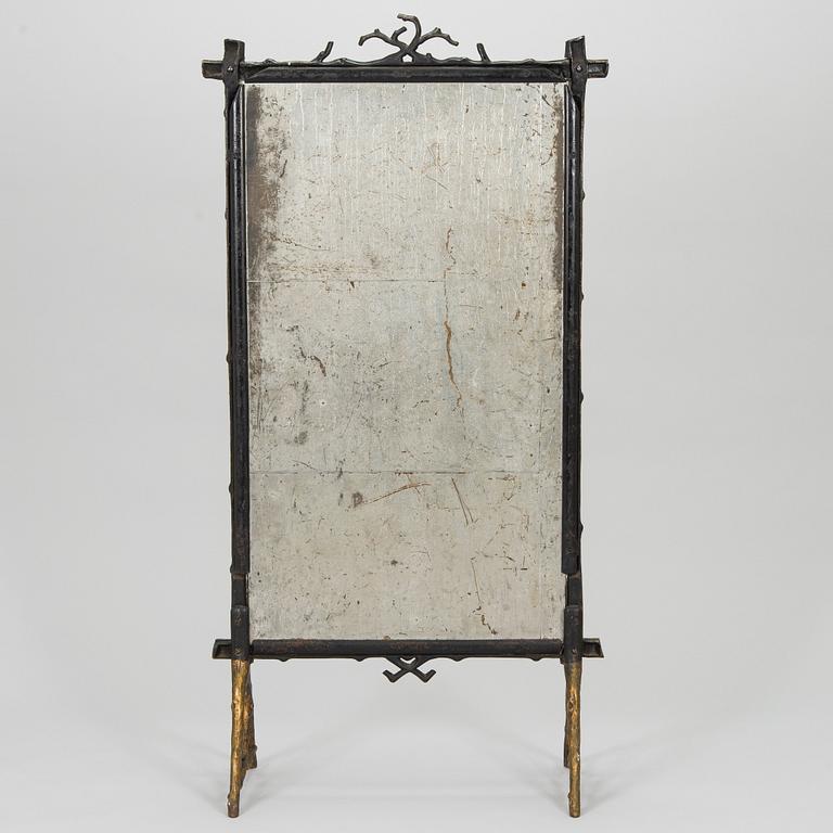 A late 19th-century fireplace screen.