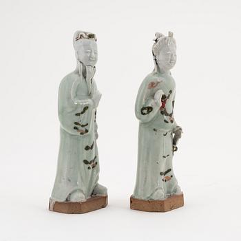 Two celadon glazed porcelain figurines of immortals, China, Qing dynasty, 18th Century.