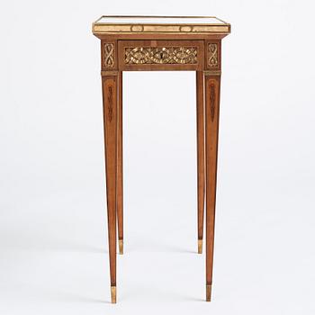 A Gustavian marquetry, ormolu-mounted, and marble table by G. Iwersson (master in Stockholm 1778-1813), signed 1781.