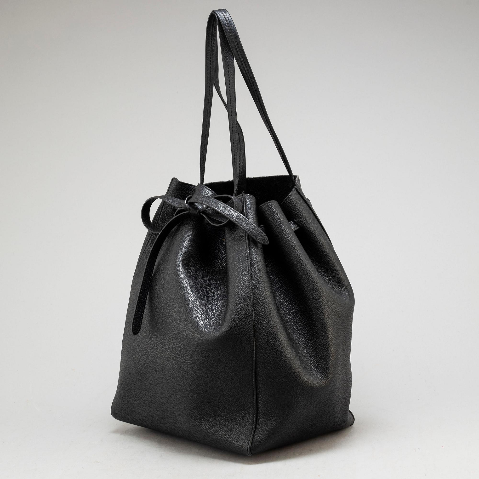 CÉLINE, a black calf leather 'Cabas Phantom' tote bag.