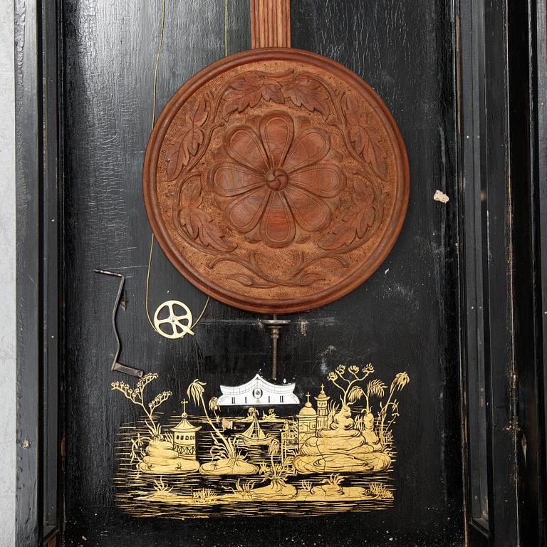 A lacquerwork wall pendulum clock, late 19th Century.