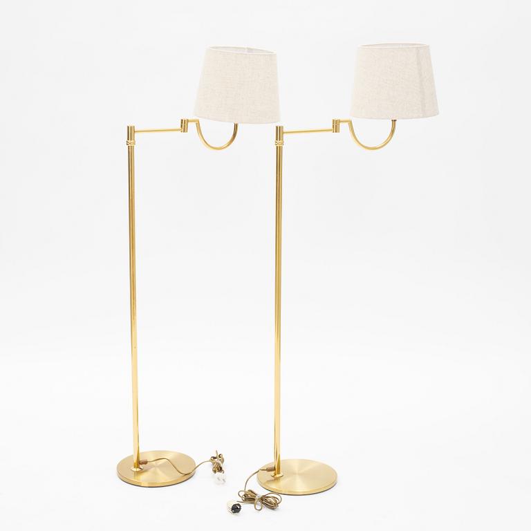 A pair of brass floor lamps EWÅ, Sweden, later part of the 20th century.