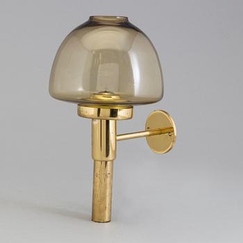 HANS AGNE JAKOBSSON, VÄGGLYCKTA, mässing, Markaryd, 1900-talets andra hälft.