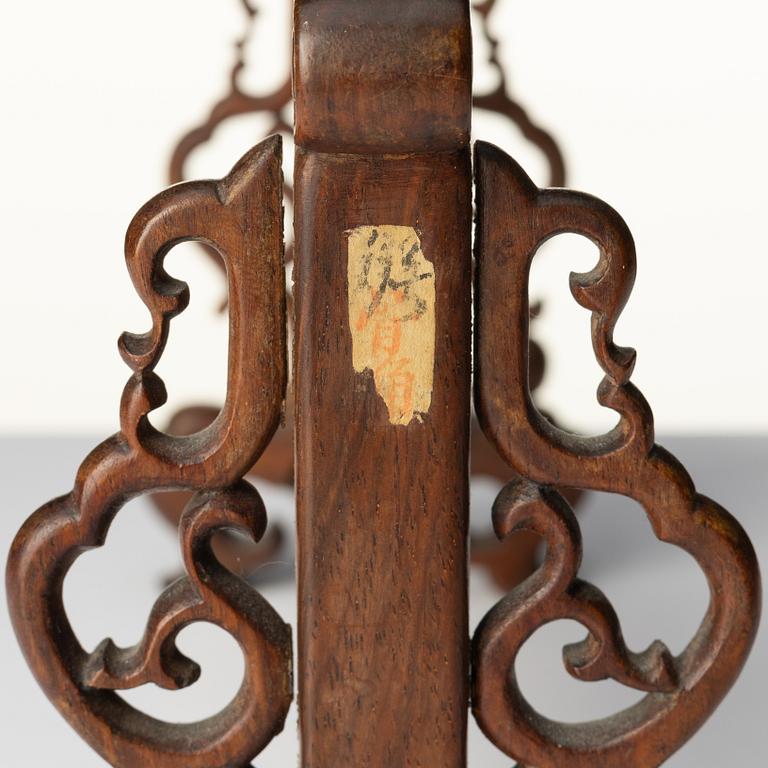 A group of Chinese wooden stands, late Qing dynasty and 21st century.