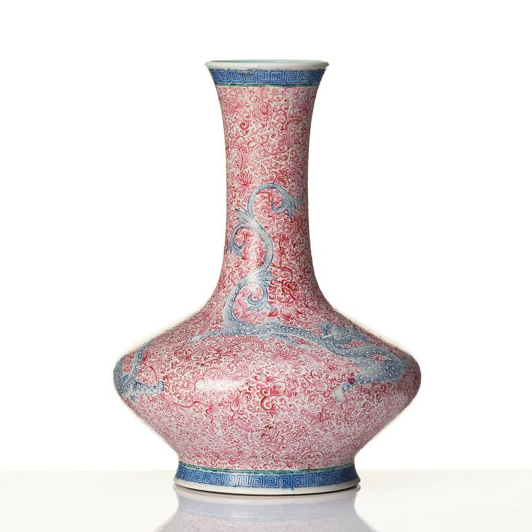 A rare pink and blue enamelled vase with dragons, late Qing dynasty/Republic with an apocryphal Qianlong mark.