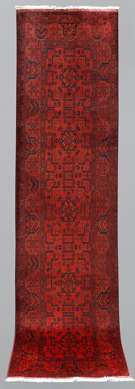 An Afghan runner, so called Khan Mohammadi, ca 297 x 78 cm.