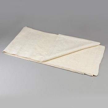 A TABLE CLOTH, linen damask, "Ymnighetshornet", ca 294 x 148 cm, signed C.W. T:tORP SVERIGE.