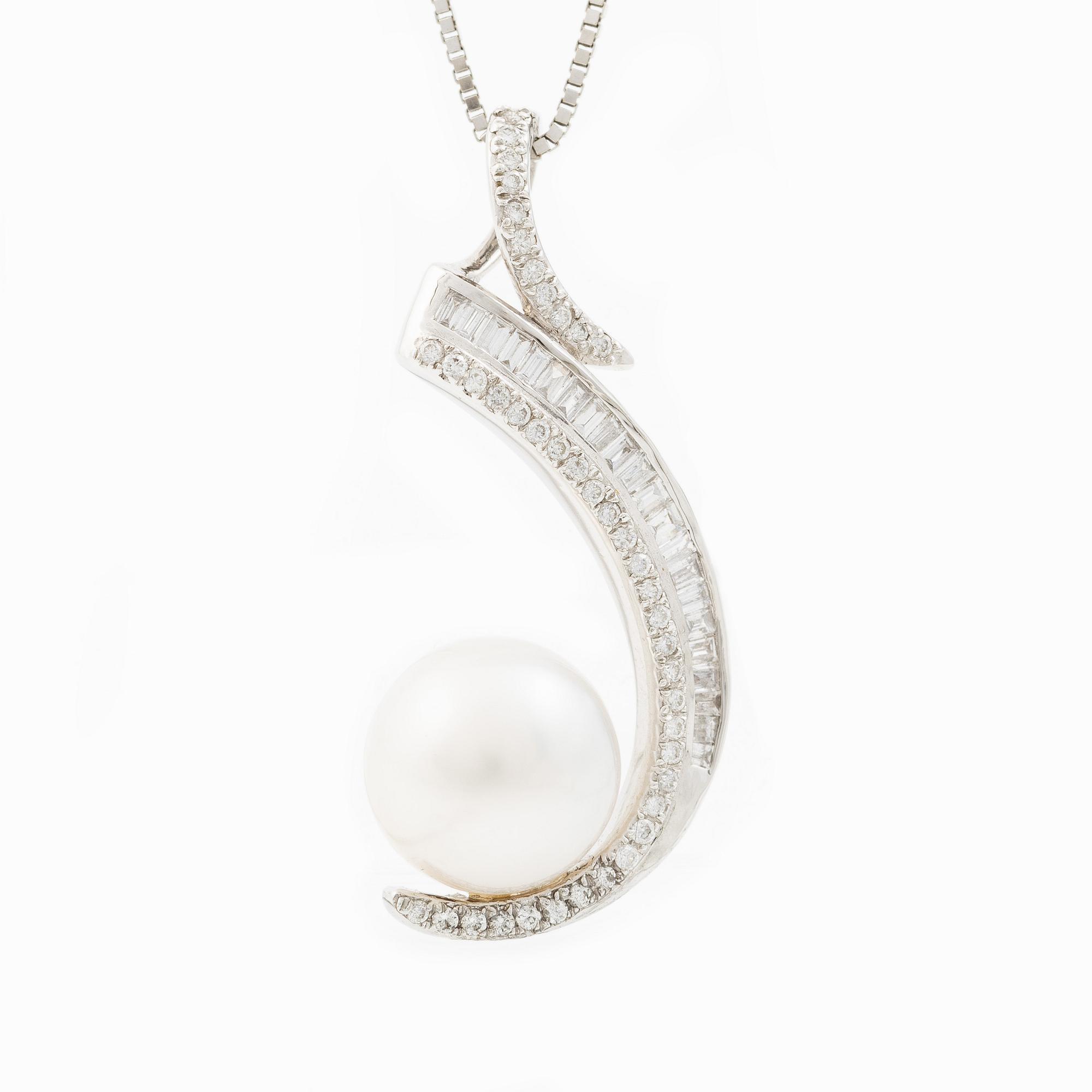 Pendant, 18K white gold with a cultured pearl and baguette and brilliant-cut diamonds.