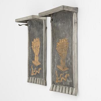 David Wretling, a pair of 1920's/30's Swedish Grace pewter wall sconces, signed.
