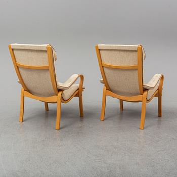 GUSTAV AXEL BERG, a pair of 'Peter' easy chairs, Bröderna Andersson.