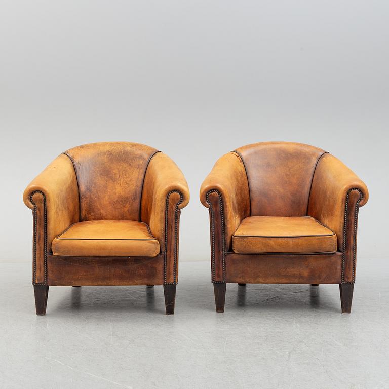 A pair of easy chairs, late 20th century.