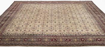 An antique Agra carpet, north India c. 430 x 392 cm.
