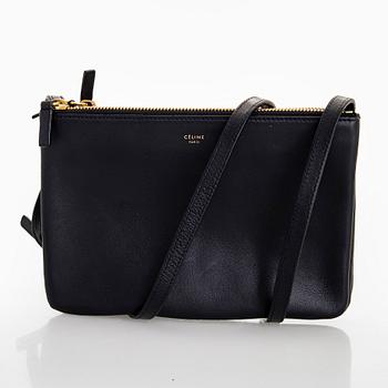 Céline, a black leather 'Trio Small' bag.
