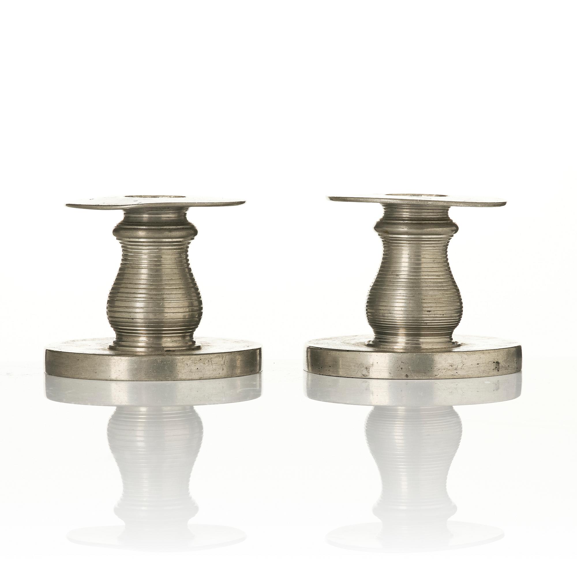 Nils Fougstedt, a pair of candlesticks model 1189, Firma Svenskt Tenn, Stockholm, 1929.