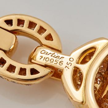 Cartier ett par örhängen 18K guld med runda briljantslipade diamanter.