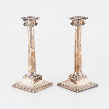 A pair of silver-plate candlesticks, early 20th century.