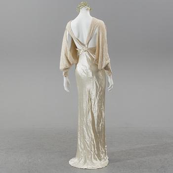 A satin wedding dress, circa 1935.