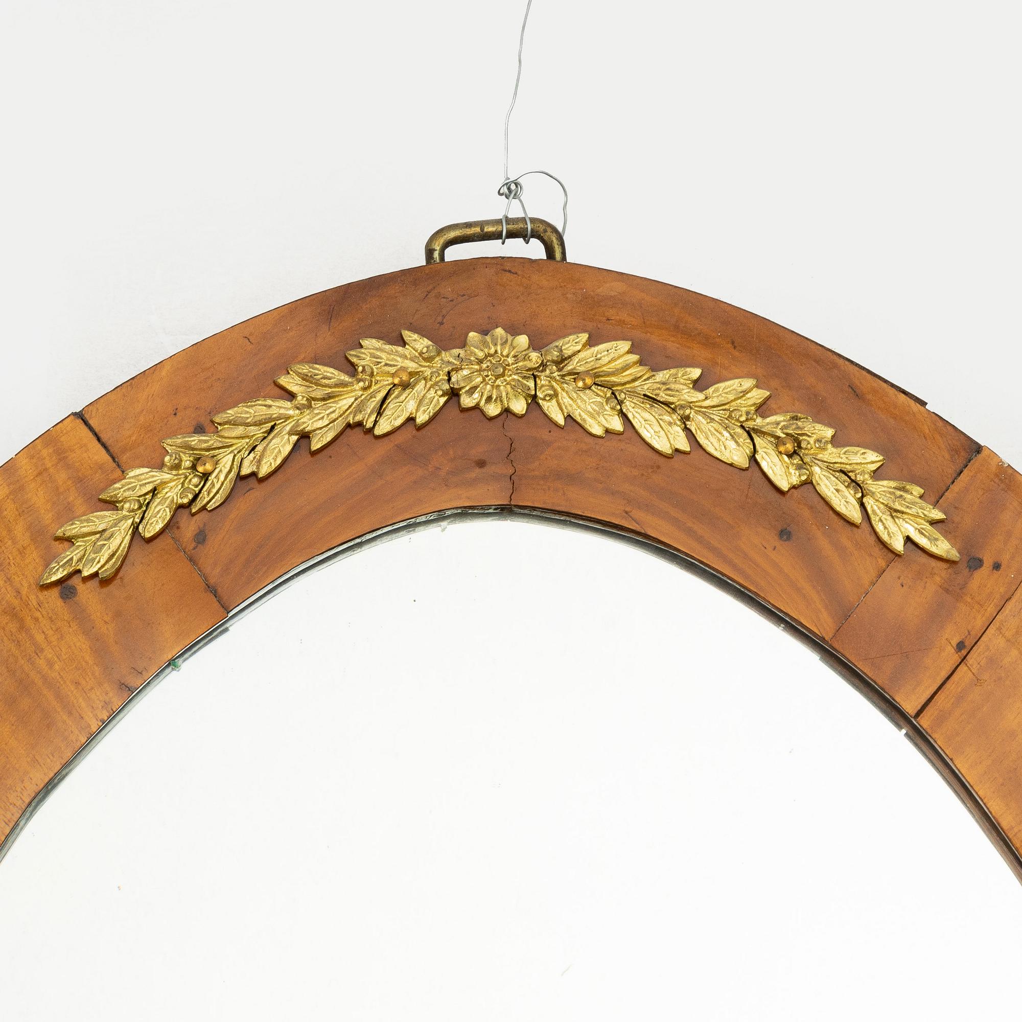 A pair of Swedish Empire mirror sconces, first half of the 19th century.