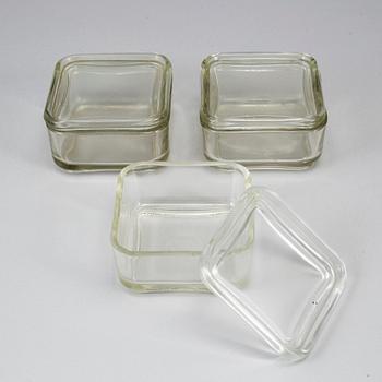 WILHELM WAGENFELD, six 'Kubus' glass containers and a jug