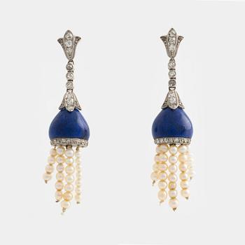 Earrings, with lapis lazuli, old-cut diamonds, and tassels with pearls.