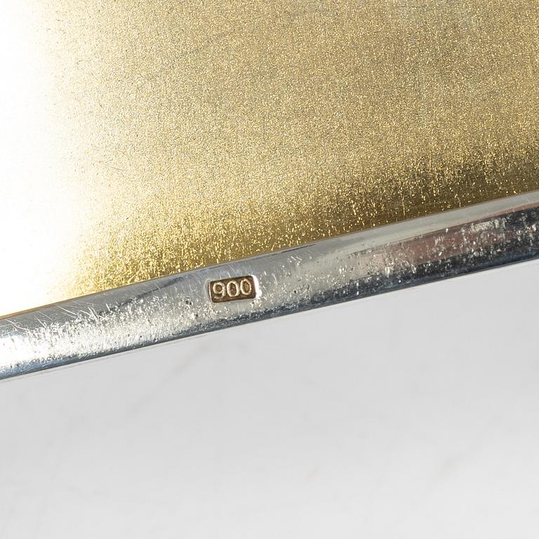 Cigarette case, silver, with a motif of Anders Zorn's "Flickan på loftet" from 1905 in enamel.