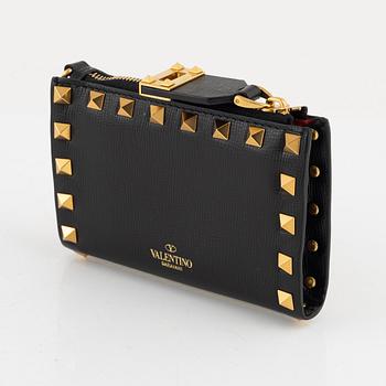 Valentino Garavani, a leather and studs wallet.