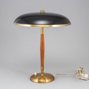 A Boréns brass and teak table lamp. Borås, Sweden mid 20th century.