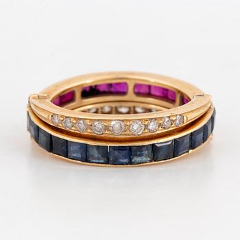 Calibre-cut ruby and sapphire and brillint-cut diamond ring.