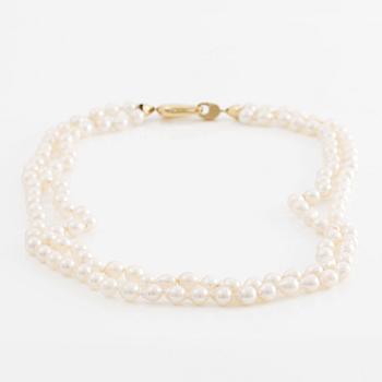 Necklace two rows of cultured pearls clasp 18K gold.