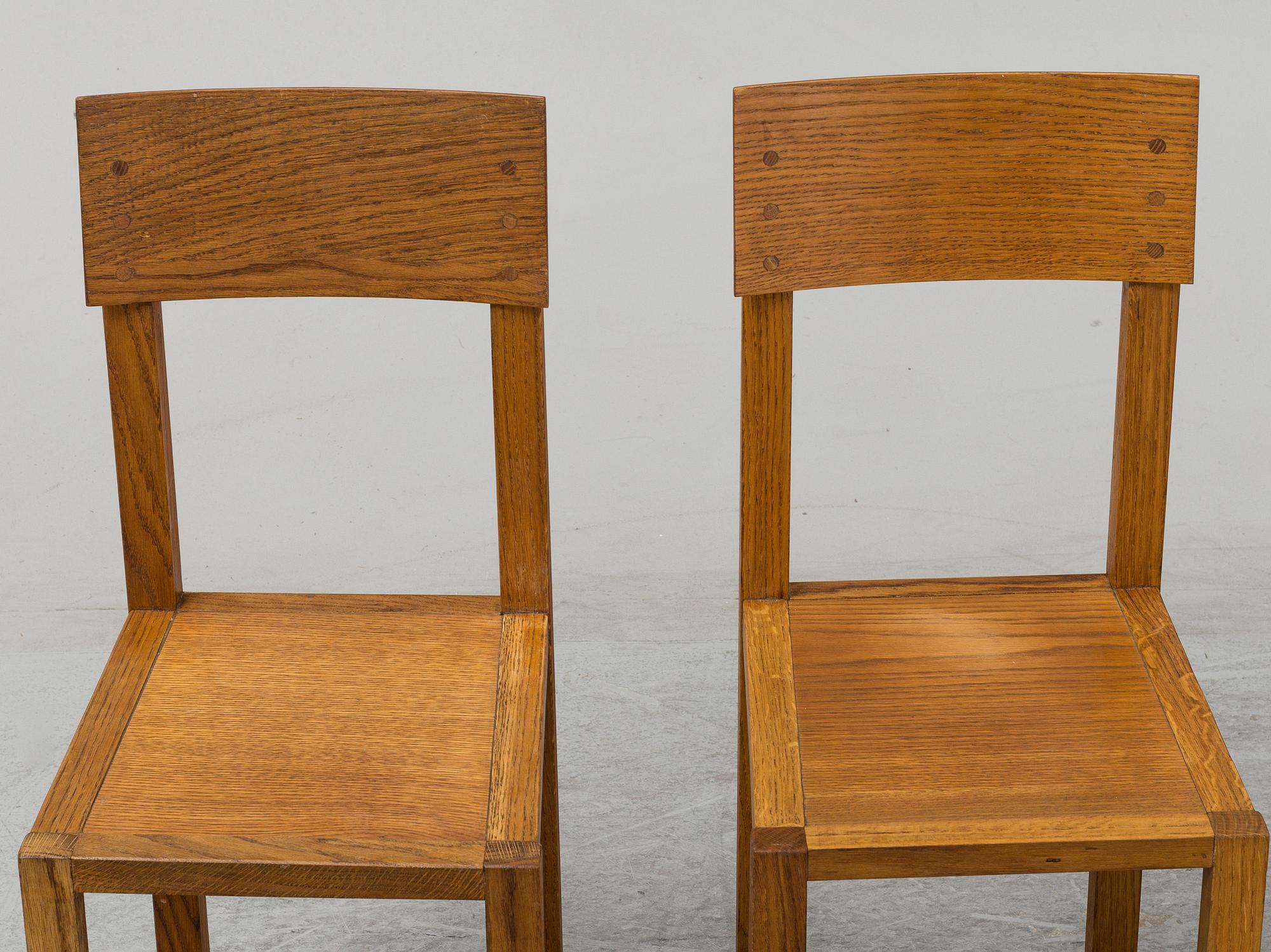 MARIO PRANDINA, an oak table and four chairs, Plinio Il Giovane, Italy.