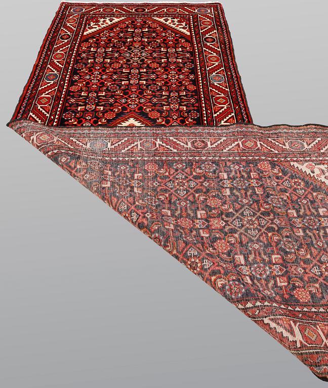 A pictoral Hamadan runner, ca 310 x 115 cm.
