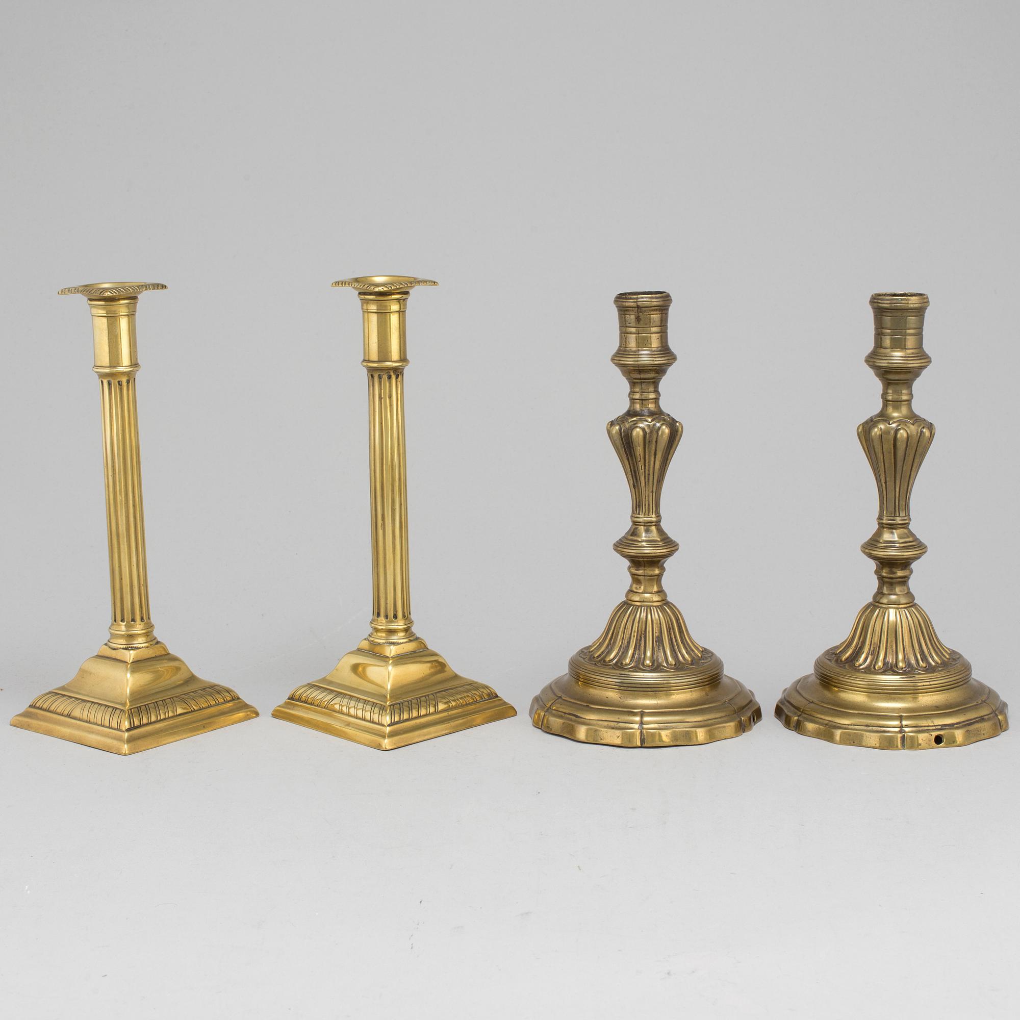 CANDLESTICKS, two pairs, brass, 18th and 19th century.