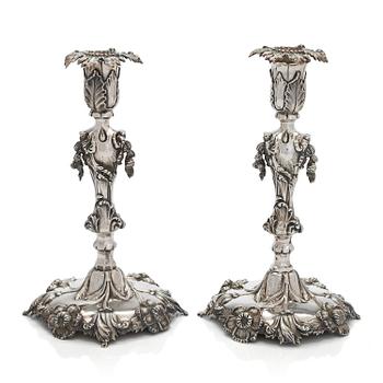 Gustaf Möllenborg, A pair of Neo-Rococo silver candlesticks, maker's mark of Gustaf  Möllenborg, Stockholm 1848.