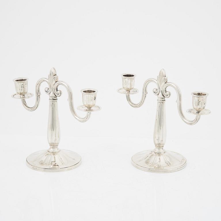 A pair of Swedish silver candelabra, mark of GAB, Stockholm 1931.