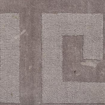 A Layered "Wool Cubes" carpet, 390x620 cm.
