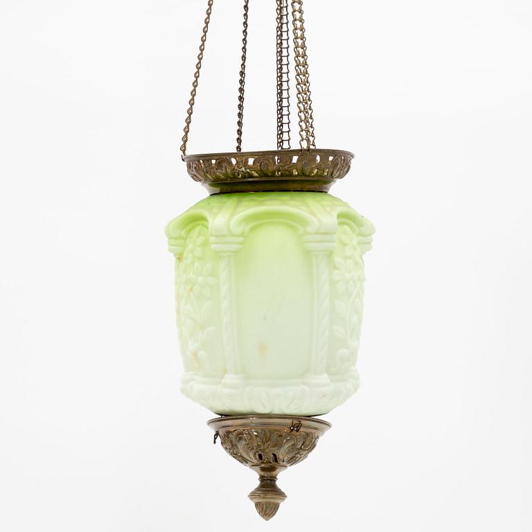 An art noveau glass and brass ceiling lamp from around the year 1900.