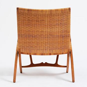 Hans J. Wegner, a foldable easy chair model 512, Johannes Hansen, Copenhagen, 1950s-60s.