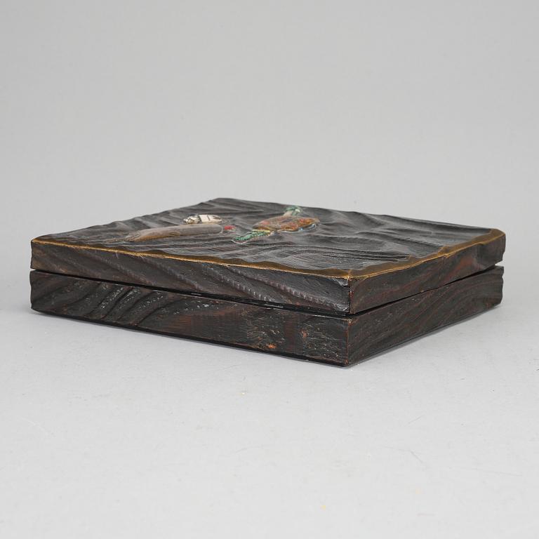 A Japanese lacquered wooden box, Meiji period (1868-1912). Signed inside cover.