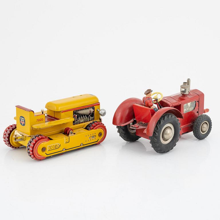 Five tin toys, including Arnold and Gama, 20th Century.