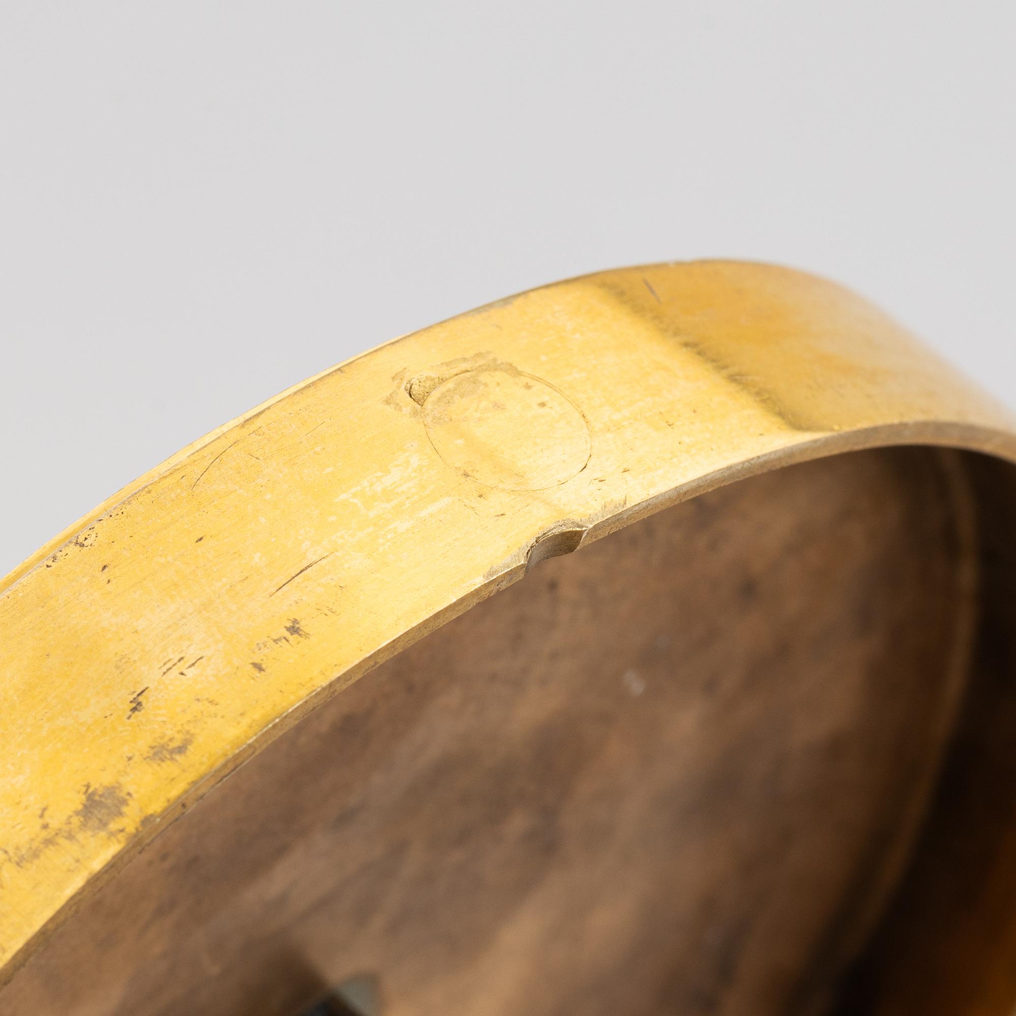 A pair of gilt-bronze Emnpire style candlesticks in the manner of Claude Galle, 19th century.